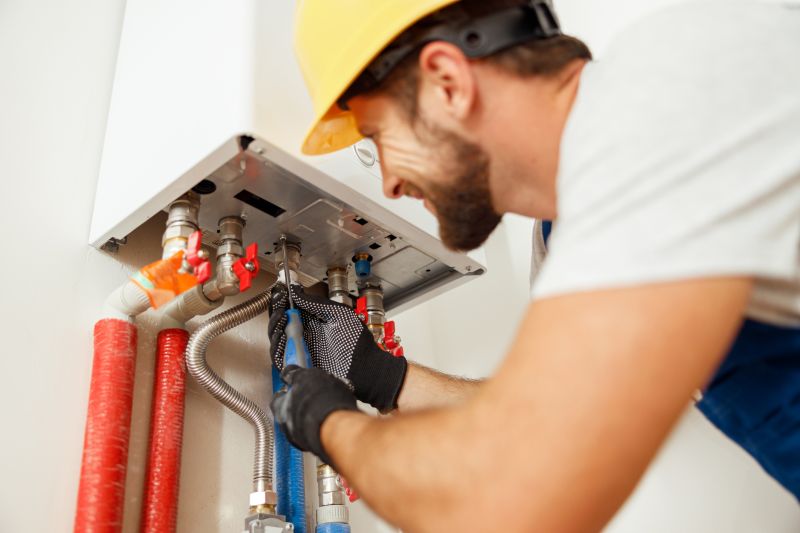 Licensed Plumber Installing Heaters